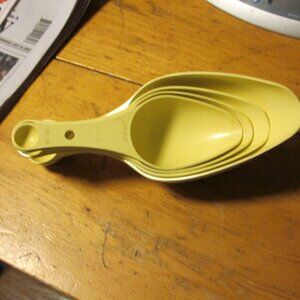 vtg MCM ECKO nesting harvest gold measuring scoops duel scoop spoons on end